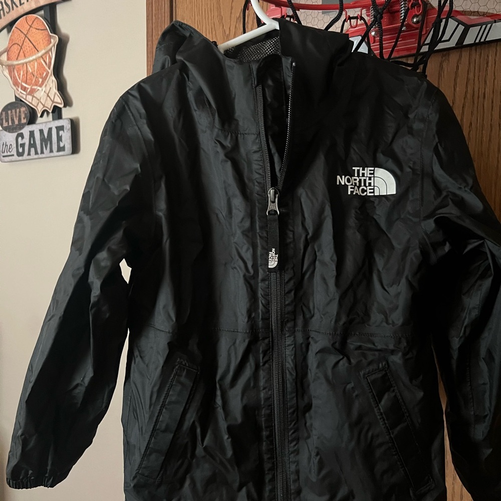 North face black rain jacket.